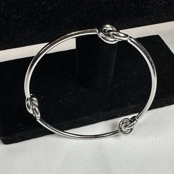 Elegant Silver Tone Knot Bracelet - Picture 5 of 7